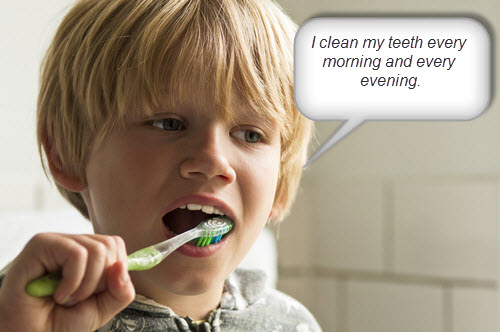 Boy cleaning his teeth